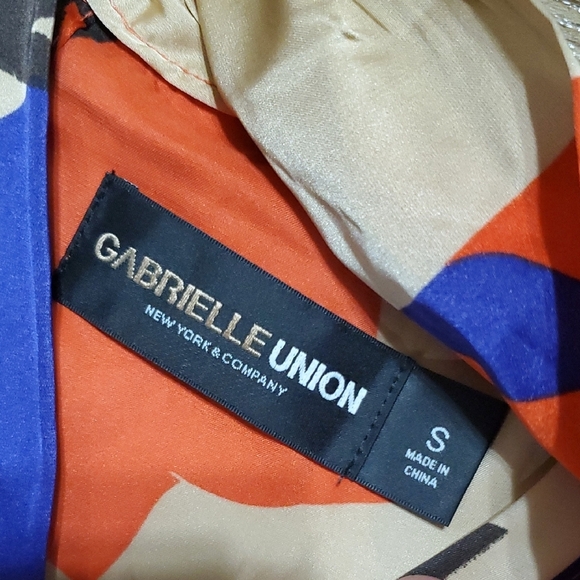 Vibrant Red and Blue Caped Jumpsuit with Abstract Print - Picture 3 of 8